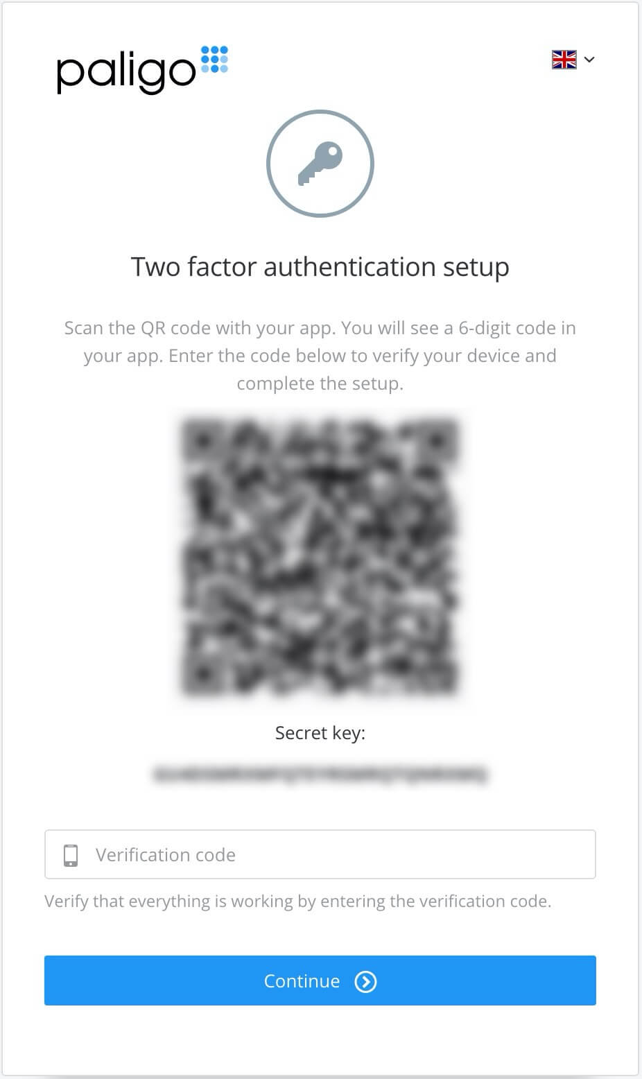 Two factor authentication 2FA authentication setup page showing QR code and secret key. Both blurred for security in image.
